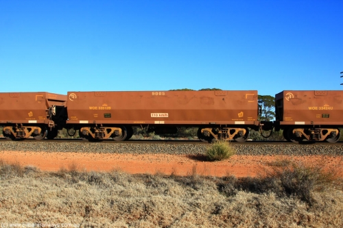 100731 02445
WOE type iron ore waggon WOE 33512 is one of a batch of one hundred and twenty eight built by United Group Rail WA between August 2008 and March 2009 with serial number 950211-052 and fleet number 9005 for Koolyanobbing iron ore operations, on empty train 6418 at Binduli Triangle, July 31, 2010.
Keywords: WOE-type;WOE33512;United-Group-Rail-WA;950211-052;