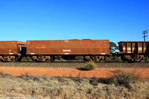 100731 02453
WOE type iron ore waggon WOE 33335 is one of a batch of one hundred and forty one built by United Goninan WA between November 2005 and April 2006 with serial number 950142-040 and fleet number 834 for Koolyanobbing iron ore operations, on empty train 6418 at Binduli Triangle, July 31, 2010.
Keywords: WOE-type;WOE33335;United-Goninan-WA;950142-040;