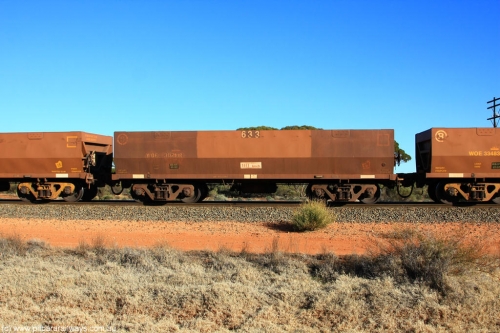 100731 02459
WOE type iron ore waggon WOE 30291 is one of a batch of one hundred and thirty built by Goninan WA between March and August 2001 with serial number 950092-041 and fleet number 633 for Koolyanobbing iron ore operations, on empty train 6418 at Binduli Triangle, July 31, 2010.
Keywords: WOE-type;WOE30291;Goninan-WA;950092-041;