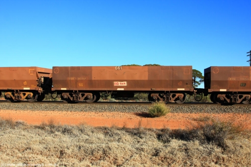 100731 02465
WOE type iron ore waggon WOE 31076 is one of a batch of one hundred and thirty built by Goninan WA between March and August 2001 with serial number 950092-066 and fleet number 661 for Koolyanobbing iron ore operations, on empty train 6418 at Binduli Triangle, July 31, 2010.
Keywords: WOE-type;WOE31076;Goninan-WA;950092-066;