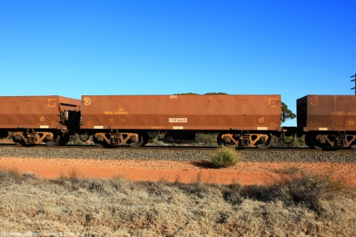 100731 02466
WOE type iron ore waggon WOE 33495 is one of a batch of one hundred and twenty eight built by United Group Rail WA between August 2008 and March 2009 with serial number 950211-035 and fleet number 8985 for Koolyanobbing iron ore operations, on empty train 6418 at Binduli Triangle, July 31, 2010.
Keywords: WOE-type;WOE33495;United-Group-Rail-WA;950211-035;