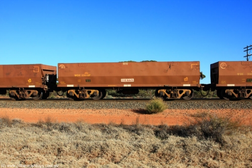 100731 02484
WOE type iron ore waggon WOE 33515 is one of a batch of one hundred and twenty eight built by United Group Rail WA between August 2008 and March 2009 with serial number 950211-055 and fleet number 9012 for Koolyanobbing iron ore operations, on empty train 6418 at Binduli Triangle, July 31, 2010.
Keywords: WOE-type;WOE33515;United-Group-Rail-WA;950211-055;