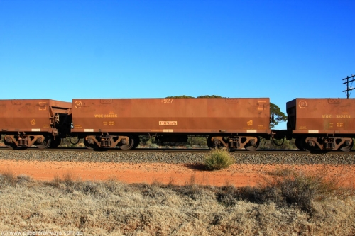 100731 02492
WOE type iron ore waggon WOE 33428 is one of a batch of one hundred and forty one built by United Group Rail WA between November 2005 and April 2006 with serial number 950142-133 and fleet number 8927 for Koolyanobbing iron ore operations, on empty train 6418 at Binduli Triangle, July 31, 2010.
Keywords: WOE-type;WOE33428;United-Group-Rail-WA;950142-133;