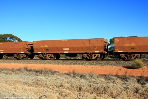 100731 02519
WOE type iron ore waggon WOE 33513 is one of a batch of one hundred and twenty eight built by United Group Rail WA between August 2008 and March 2009 with serial number 950211-053 and fleet number 8999 for Koolyanobbing iron ore operations, on empty train 6418 at Binduli Triangle, 31st July 2010.
Keywords: WOE-type;WOE33513;United-Group-Rail-WA;950211-053;