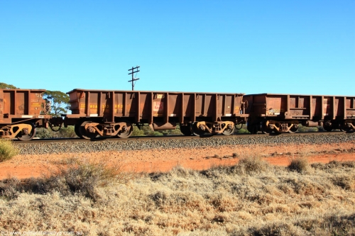 100731 02526
WOA type iron ore waggon WOA 31309 is one of a batch of thirty nine built by WAGR Midland Workshops between 1970 and 1971 with fleet number 205 for Koolyanobbing iron ore operations, with a 75 ton and 1018 ft³ capacity, on empty train 6418 at Binduli Triangle, July 31, 2010.
Keywords: WOA-type;WOA31309;WAGR-Midland-WS;