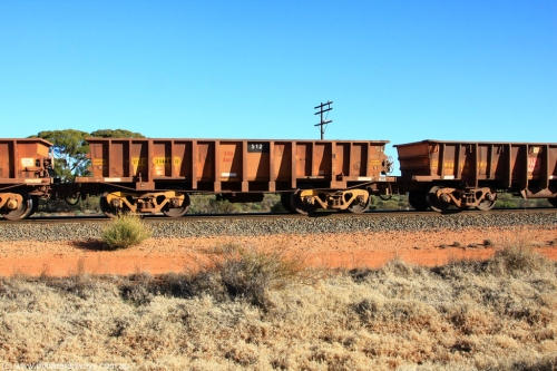 100731 02527
WOD type iron ore waggon WOD 31449 is one of a batch of sixty two built by Goninan WA between April and August 2000 with serial number 950086-021 and fleet number 512 for Koolyanobbing iron ore operations with a 75 ton capacity for Portman Mining to cart their Koolyanobbing iron ore to Esperance, now with PORTMAN painted out, on empty train 6418 at Binduli Triangle, July 31, 2010.
Keywords: WOD-type;WOD31449;Goninan-WA;950086-021;