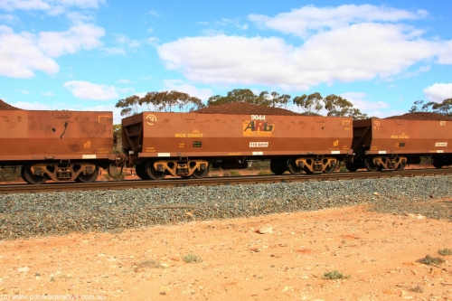 100731 02838
WOE type iron ore waggon WOE 33553 is one of a batch of one hundred and twenty eight built by United Group Rail WA between August 2008 and March 2009 with serial number 950211-093 and fleet number 9044 for Koolyanobbing iron ore operations, on loaded train 7415 at Binduli Triangle, July 31, 2010.
Keywords: WOE-type;WOE33553;United-Group-Rail-WA;950211-093;