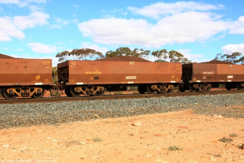 100731 02839
WOE type iron ore waggon WOE 33378 is one of a batch of one hundred and forty one built by United Goninan WA between November 2005 and April 2006 with serial number 950142-083 and fleet number 877 for Koolyanobbing iron ore operations, on loaded train 7415 at Binduli Triangle, July 31, 2010.
Keywords: WOE-type;WOE33378;United-Goninan-WA;950142-083;