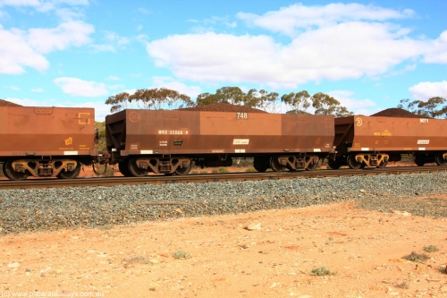 100731 02840
WOE type iron ore waggon WOE 33249 is one of a batch of twenty seven built by Goninan WA between September and October 2002 with serial number 950103-016 and fleet number 748 for Koolyanobbing iron ore operations, on loaded train 7415 at Binduli Triangle, July 31, 2010.
Keywords: WOE-type;WOE33249;Goninan-WA;950103-016;