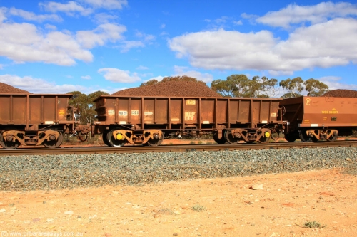 100731 02852
WO type iron ore waggon WO 31297 is one of a batch of fifteen built by WAGR Midland Workshops between July and October 1968 with fleet number 176 for Koolyanobbing iron ore operations, with a 75 ton and 1018 ft³ capacity, on loaded train 7415 at Binduli Triangle, July 31, 2010. This unit was converted to WOG for gypsum in late 1980s till 1994 when it was re-classed back to WO.
Keywords: WO-type;WO31297;WAGR-Midland-WS;