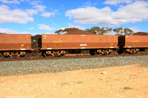 100731 02870
WOE type iron ore waggon WOE 33538 is one of a batch of one hundred and twenty eight built by United Group Rail WA between August 2008 and March 2009 with serial number 950211-078 and fleet number 9039 for Koolyanobbing iron ore operations, on loaded train 7415 at Binduli Triangle, July 31, 2010.
Keywords: WOE-type;WOE33538;United-Group-Rail-WA;950211-078;
