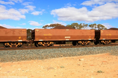 100731 02871
WOE type iron ore waggon WOE 33525 is one of a batch of one hundred and twenty eight built by United Group Rail WA between August 2008 and March 2009 with serial number 950211-065 and fleet number 9038 for Koolyanobbing iron ore operations, on loaded train 7415 at Binduli Triangle, July 31, 2010.
Keywords: WOE-type;WOE33525;United-Group-Rail-WA;950211-065;