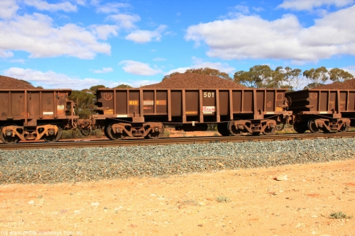 100731 02877
WOD type iron ore waggon WOD 31300 is one of a batch of sixty two built by Goninan WA between April and August 2000 with serial number 950086-011 and fleet number 501 for Koolyanobbing iron ore operations with a 75 ton capacity and a replacement for a WO type waggon number, for Portman Mining to cart their Koolyanobbing iron ore to Esperance, on loaded train 7415 at Binduli Triangle, July 31, 2010.
Keywords: WOD-type;WOD31300;Goninan-WA;950086-011;