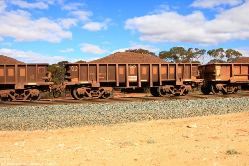 100731 02879
WOD type iron ore waggon WOD 31462 is one of a batch of sixty two built by Goninan WA between April and August 2000 with serial number 950086-034 and fleet number 525 for Koolyanobbing iron ore operations with a 75 ton capacity for Portman Mining to cart their Koolyanobbing iron ore to Esperance, now with PORTMAN painted out, on loaded train 7415 at Binduli Triangle, July 31, 2010.
Keywords: WOD-type;WOD31462;Goninan-WA;950086-034;