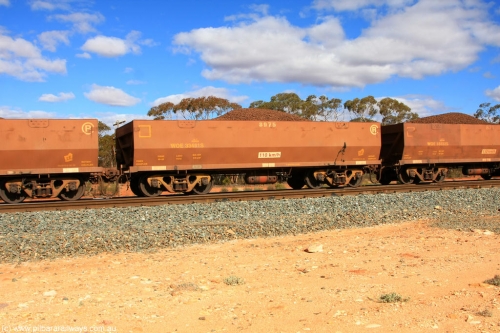 100731 02901
WOE type iron ore waggon WOE 33481 is one of a batch of one hundred and twenty eight built by United Group Rail WA between August 2008 and March 2009 with serial number 950211-023 and fleet number 8975 for Koolyanobbing iron ore operations, on loaded train 7415 at Binduli Triangle, July 31, 2010.
Keywords: WOE-type;WOE33481;United-Group-Rail-WA;950211-023;