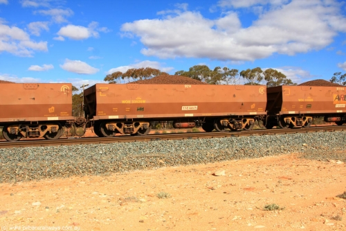100731 02904
WOE type iron ore waggon WOE 33526 is one of a batch of one hundred and twenty eight built by United Group Rail WA between August 2008 and March 2009 with serial number 950211-066 and fleet number 9014 for Koolyanobbing iron ore operations, on loaded train 7415 at Binduli Triangle, July 31, 2010.
Keywords: WOE-type;WOE33526;United-Group-Rail-WA;950211-066;