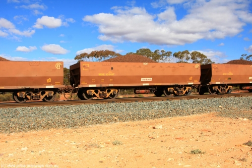 100731 02921
WOE type iron ore waggon WOE 33549 is one of a batch of one hundred and twenty eight built by United Group Rail WA between August 2008 and March 2009 with serial number 950211-089 and fleet number 9041 for Koolyanobbing iron ore operations, on loaded train 7415 at Binduli Triangle, July 31, 2010.
Keywords: WOE-type;WOE33549;United-Group-Rail-WA;950211-089;