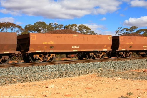 100731 02930
WOE type iron ore waggon WOE 33505 is one of a batch of one hundred and twenty eight built by United Group Rail WA between August 2008 and March 2009 with serial number 950211-045 and fleet number 9007 for Koolyanobbing iron ore operations, on loaded train 7415 at Binduli Triangle, 31st July 2010.
Keywords: WOE-type;WOE33505;United-Group-Rail-WA;950211-045;