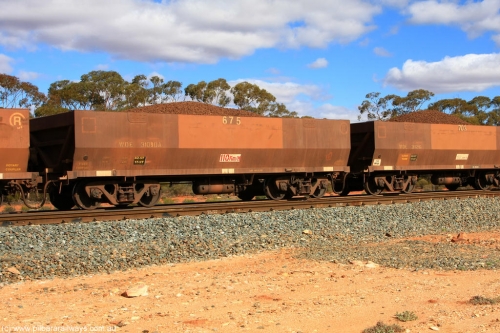 100731 02932
WOE type iron ore waggon WOE 31090 is one of a batch of one hundred and thirty built by Goninan WA between March and August 2001 with serial number 950092-080 and fleet number 675 for Koolyanobbing iron ore operations, on loaded train 7415 at Binduli Triangle, July 31, 2010.
Keywords: WOE-type;WOE31090;Goninan-WA;950092-080;