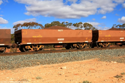 100731 02946
WOE type iron ore waggon WOE 33577 is one of a batch of one hundred and twenty eight built by United Group Rail WA between August 2008 and March 2009 with serial number 950211-117 and fleet number 9077 for Koolyanobbing iron ore operations, on loaded train 7415 at Binduli Triangle, July 31, 2010.
Keywords: WOE-type;WOE33577;United-Group-Rail-WA;950211-117;