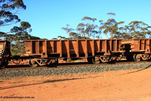 100731 03064
WOC type iron ore waggon WOC 31358 is one of a batch of thirty built by Goninan WA between October 1997 to January 1998 with fleet number 418 for Koolyanobbing iron ore operations with a 75 ton capacity and lettered for KIPL, Koolyanobbing Iron Pty Ltd which has had KIPL painted over, empty train arriving at Binduli Triangle, July 31, 2010.
Keywords: WOC-type;WOC31358;Goninan-WA;