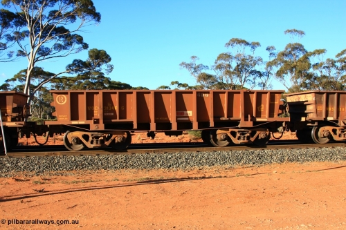 100731 03065
WOC type iron ore waggon WOC 31346 is one of a batch of thirty built by Goninan WA between October 1997 to January 1998 with fleet number 406 for Koolyanobbing iron ore operations with a 75 ton capacity and lettered for KIPL, Koolyanobbing Iron Pty Ltd which has had KIPL painted over, empty train arriving at Binduli Triangle, July 31, 2010.
Keywords: WOC-type;WOC31346;Goninan-WA;