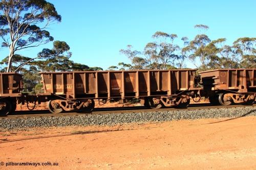 100731 03075
WO type iron ore waggon WO 31234 is one of a batch of eighty six built by WAGR Midland Workshops between 1967 and March 1968 with fleet number 126 for Koolyanobbing iron ore operations, with a 75 ton and 1018 ft³ capacity, empty train arriving at Binduli Triangle, July 31, 2010. This unit was converted to WOS superphosphate in the late 1980s till 1994 when it was re-classed back to WO.
Keywords: WO-type;WO31234;WAGR-Midland-WS;WOS-type;