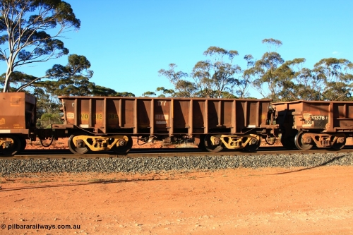100731 03116
WO type iron ore waggon WO 31298 is one of a batch of fifteen built by WAGR Midland Workshops between July and October 1968 with fleet number 177 for Koolyanobbing iron ore operations, with a 75 ton and 1018 ft³ capacity, empty train arriving at Binduli Triangle, July 31, 2010. This unit was converted to WOC for coal in 1986 till 1994 when it was re-classed back to WO.
Keywords: WO-type;WO31298;WAGR-Midland-WS;