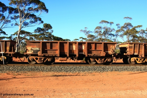100731 03117
WOB type iron ore waggon WOB 31376 is leader of a batch of twenty five built by Comeng WA between 1974 and 1975 and converted from Mt Newman high sided waggons by WAGR Midland Workshops with a capacity of 67 tons with fleet number 301 for Koolyanobbing iron ore operations., empty train arriving at Binduli Triangle, July 31, 2010.
Keywords: WOB-type;WOB31376;Comeng-WA;Mt-Newman-Mining;