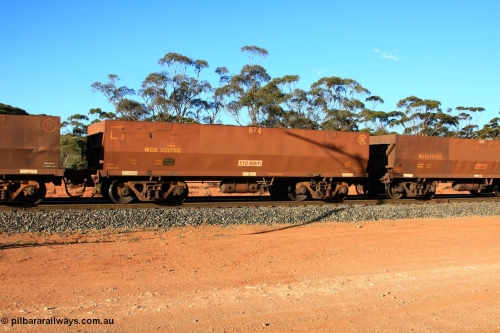 100731 03154
WOE type iron ore waggon WOE 33374 is one of a batch of one hundred and forty one built by United Goninan WA between November 2005 and April 2006 with serial number 950142-079 and fleet number 873 for Koolyanobbing iron ore operations, with a build date of 02/2006 and a revised load of 82.5 tonnes, empty train arriving at Binduli Triangle, July 31, 2010.
Keywords: WOE-type;WOE33374;United-Goninan-WA;950142-079;