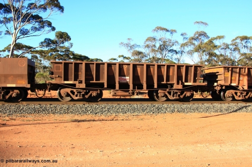 100731 03156
WOD type iron ore waggon WOD 31452 is one of a batch of sixty two built by Goninan WA between April and August 2000 with serial number 950086-024 and fleet number 515 for Koolyanobbing iron ore operations with a 75 ton capacity for Portman Mining to cart their Koolyanobbing iron ore to Esperance, PORTMAN has been painted out, empty train arriving at Binduli Triangle, July 31, 2010.
Keywords: WOD-type;WOD31452;Goninan-WA;950086-024;
