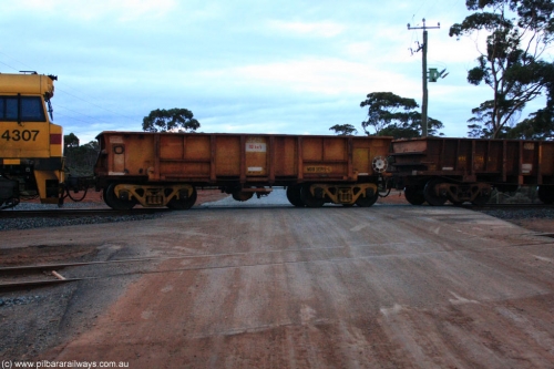 100822 6204
WOB type iron ore waggon WOB 31395 is one of a batch of twenty five built by Comeng WA between 1974 and 1975 and converted from Mt Newman high sided waggons by WAGR Midland Workshops with a capacity of 67 tons with fleet number 325 for Koolyanobbing iron ore operations. This waggon was also converted to a WSM type ballast hopper by re-fitting the cut down top section and having bottom discharge doors fitted, converted back to WOB in 1997, in ARG yellow, on empty train 1416 at Hampton, August 22, 2010.
Keywords: WOB-type;WOB31395;Comeng-WA;WSM-type;Mt-Newman-Mining;