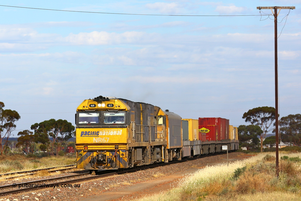 210407 9826
The 1777 km post at Parkeston with Pacific National's NR class unit NR 67 leading intermodal freight service 2MP5 with NR 88. NR 67 was built by Goninan WA for National Rail in 1996 and is a GE Cv40-9i model with serial number 7250-12 / 96-269. 7th of April 2021.
Keywords: NR-class;NR67;Goninan-WA;GE;Cv40-9i;7250-12/96-269;