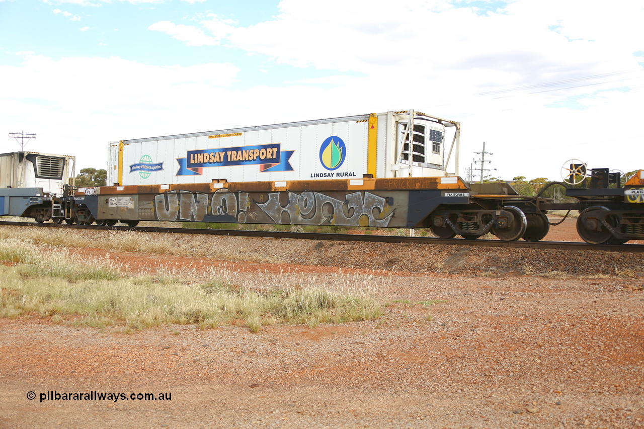 210407 9859
Parkeston, 2MP5 intermodal train, RQZY 7062, platform 5 with a Lindsay Transport 46' RFRG type reefer container LTCD 761919. The RQZY type is a five unit bar coupled well container waggon built as one of a batch of thirty two by Goninan NSW for National Rail in 1995/96.
Keywords: RQZY-type;RQZY7062;Goninan-NSW;