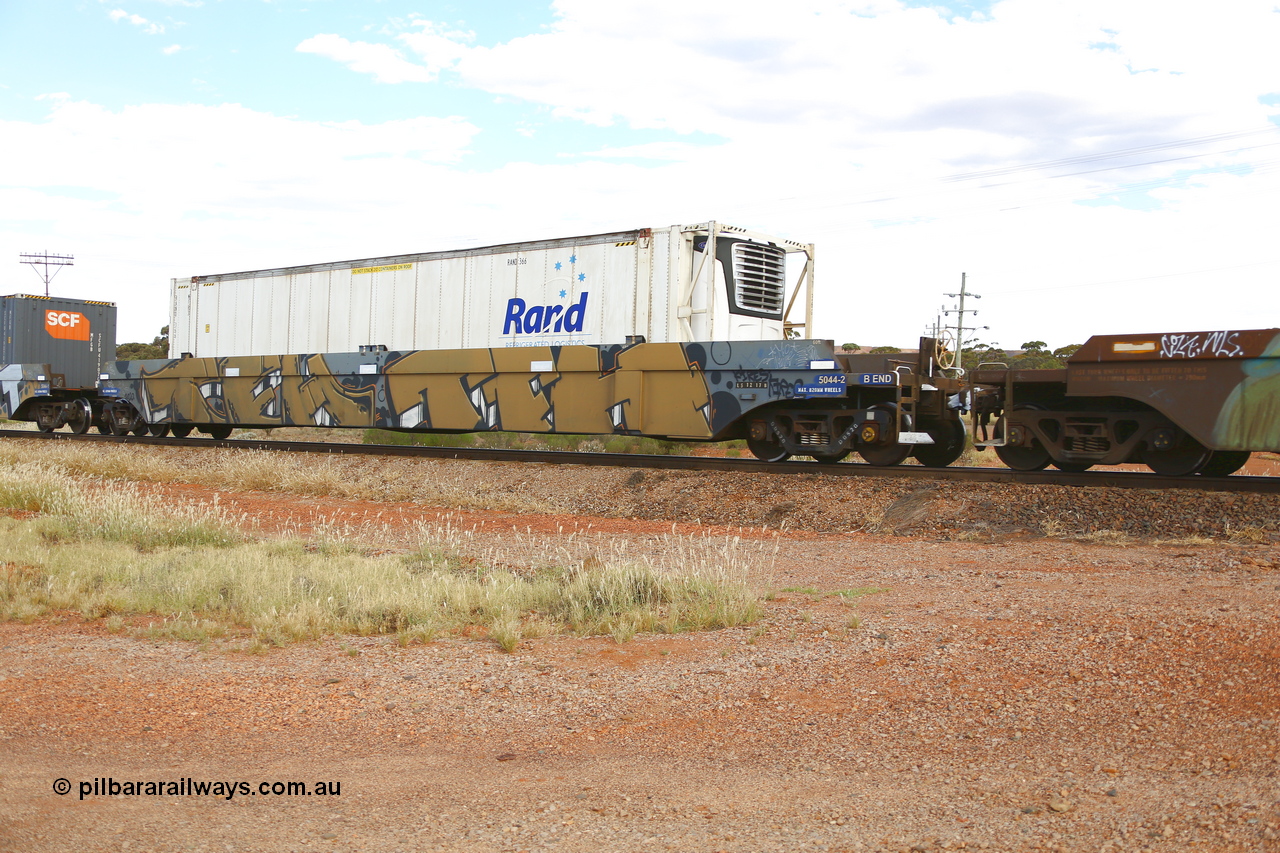 210407 9867
Parkeston, 2MP5 intermodal train, CQWY type well waggon 5044 well 2 with a RAND Refrigerated Logistics 46' MFR3 type reefer container RAND 366. The CQWY well waggon pairs were built by Bluebird Rail Operations SA in a batch of sixty pairs in 2008 for CFCLA.
Keywords: CQWY-type;CQWY5044;CFCLA;Bluebird-Rail-Operations-SA;