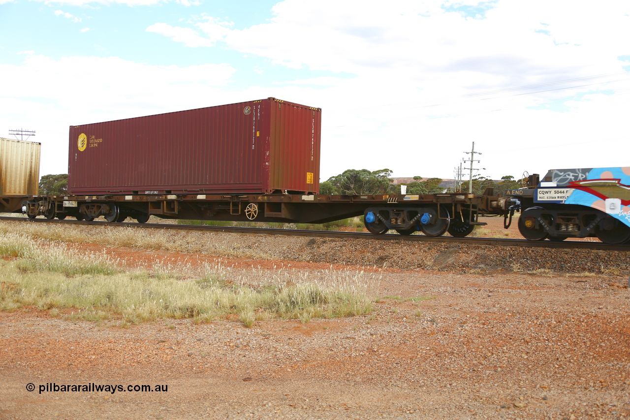 210407 9869
Parkeston, 2MP5 intermodal train, RQCY type flat waggon RQCY 784, originally built by the Victorian Railways Newport Workshops as an FQX type in 1973 in a batch of one hundred and twenty five. Recoded to VQCX in 1979, to RQCX in 1994, to National Rail in 1995 and recoded to RQCY. Loaded with a CARU Specialized Leasing 40' 4FG1 type container SLZU 760127.
Keywords: RQCY-type;RQCY784;Victorian-Railways-Newport-WS;FQX-type;VQCX-type;RQCX-type;