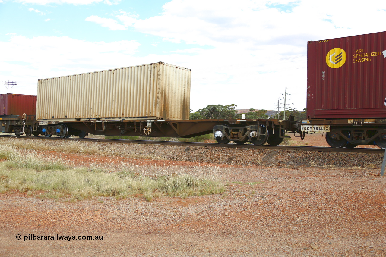 210407 9870
Parkeston, 2MP5 intermodal train, RQFY type flat waggon RQFY 49, originally built by Victorian Railways Newport Workshops as an QMX type skeletal container flat in the second batch of twenty such waggons in 1978. Loaded with a 40' Austrans 4FG1 type container AUCU 412410.
Keywords: RQFY-type;RQFY49;Victorian-Railways-Newport-WS;QMX-type;VQFX-type;RQFX-type;RQFF-type;