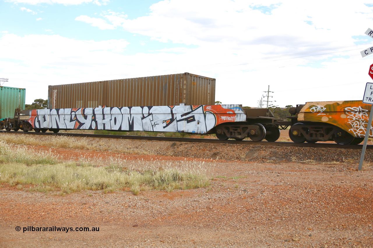 210407 9877
Parkeston, 2MP5 intermodal train, CQWY type well waggon 5055 well 1 with a SCF 4EG1 type container with Austrans AUSU 405026. The CQWY well waggon pairs were built by Bluebird Rail Operations SA in a batch of sixty pairs in 2008 for CFCLA.
Keywords: CQWY-type;CQWY5055;CFCLA;Bluebird-Rail-Operations-SA;