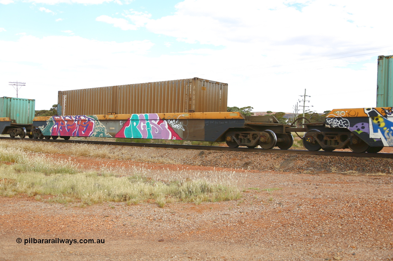 210407 9888
Parkeston, 2MP5 intermodal train, RRZY 7049 platform 3 of 5-pack well waggon set. Originally was an RQZY type, a five unit bar coupled well container waggon built as one of a batch of thirty two by Goninan NSW for National Rail in 1995/96. Recoded to RRZY when repaired. Loaded with an SCF 40' 4EG1 type container for Austrans AUSU 406143.
Keywords: RRZY-type;RRZY7049;Goninan-NSW;RQZY-type;