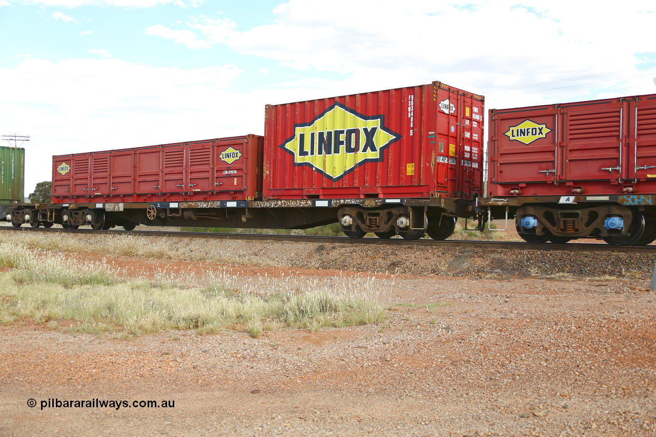 210407 9899
Parkeston, 2MP5 intermodal train, RQSY type container waggon RQSY 34304 was originally built by Goninan NSW as an OCY type in a batch of one hundred in 1974/75. Recoded to NQOY, then NQSY, then to National Rail as RQSY in 1994. Loaded with a Linfox 20' container FSWB 963488 and a 40' Linfox half height side door container LSDU 6940106.
Keywords: RQSY-type;RQSY34304;Goninan-NSW;OCY-type;NQOY-type;