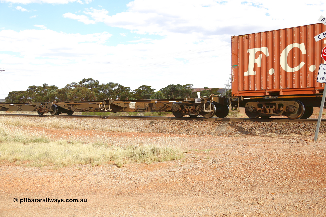 210407 9904
Parkeston, 2MP5 intermodal train, RRQY type articulated five-unit container waggon set RRQY 8316 platform 1, built by Qiqihar Rollingstock Works in China as part of a forty one unit order in 2005/06 for Pacific National.
Keywords: RRQY-type;RRQY8316;Qiqihar-Rollingstock-Works-China;