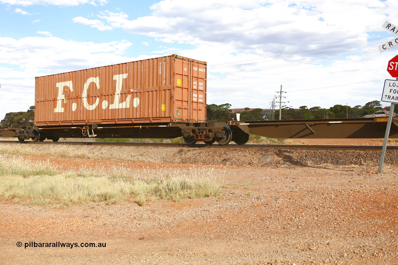 210407 9906
Parkeston, 2MP5 intermodal train, RRQY type articulated five-unit container waggon set RRQY 8316 platform 3, built by Qiqihar Rollingstock Works in China as part of a forty one unit order in 2005/06 for Pacific National. Loaded with an FCL 40' container FCDU 324657.
Keywords: RRQY-type;RRQY8316;Qiqihar-Rollingstock-Works-China;