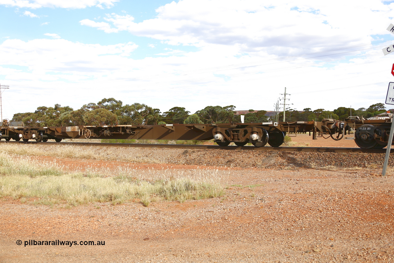 210407 9909
Parkeston, 2MP5 intermodal train, RQJW type jumbo container waggon RQJW 21976, originally built by Mittagong Engineering NSW in 1980 as the first waggon of a batch of twenty JCW 80' jumbo container waggons. Recoded to NQJW then to National Rail as RQJW in 1994.
Keywords: RQJW-type;RQJW21976;Mittagong-Engineering-NSW;JCW-type;NQJW-type;