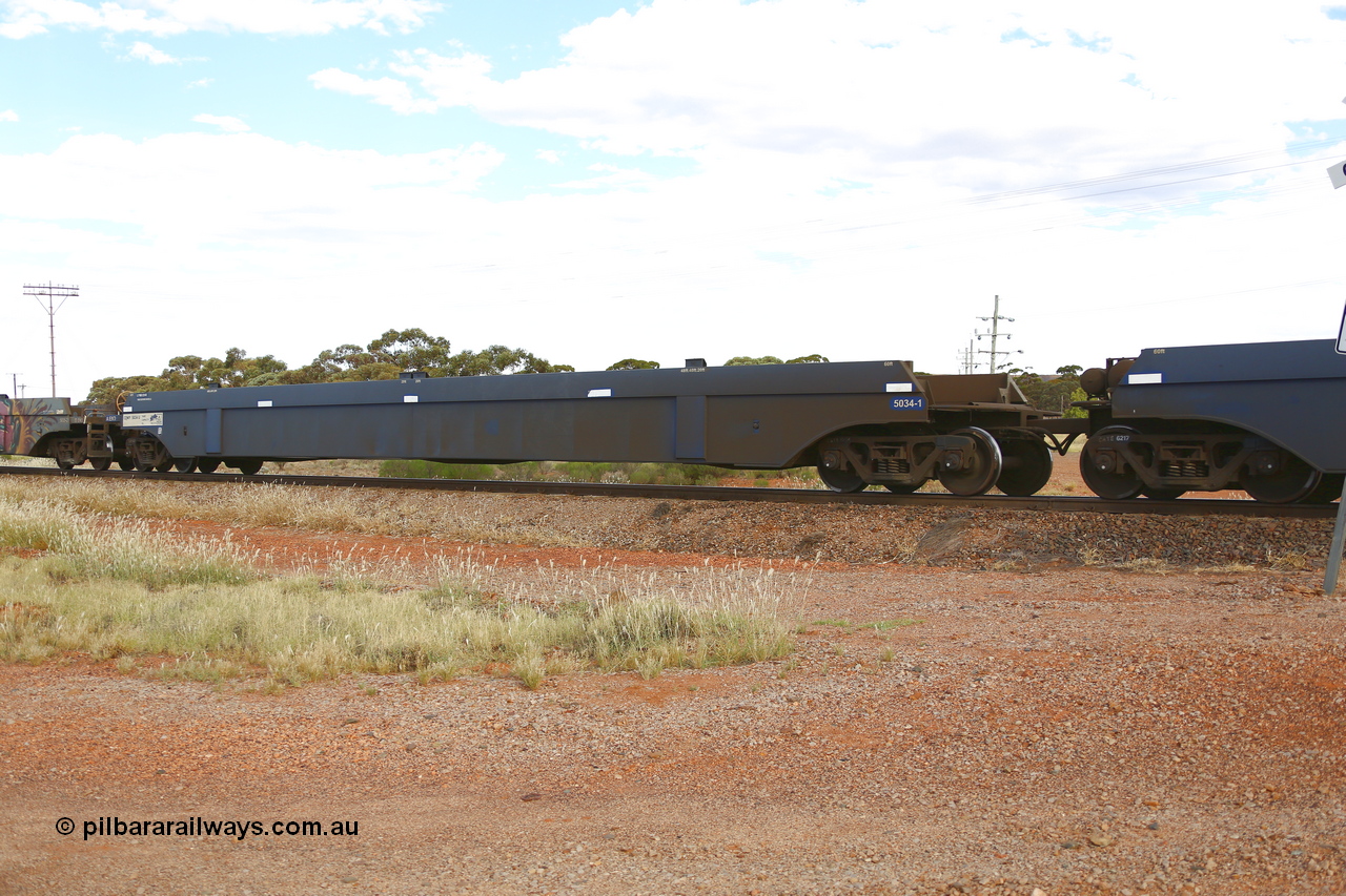 210407 9913
Parkeston, 2MP5 intermodal train, CQWY type well waggon CQWY 5034 well 1, the well waggon pairs were built by Bluebird Rail Operations SA in a batch of sixty pairs in 2008 for CFCLA.
Keywords: CQWY-type;CQWY5034;CFCLA;Bluebird-Rail-Operations-SA;