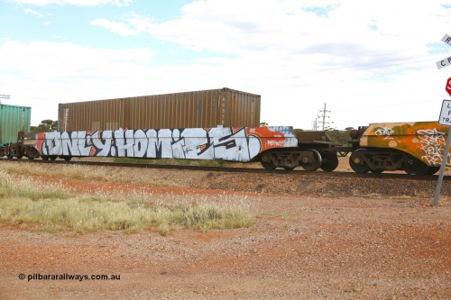 210407 9877
Parkeston, 2MP5 intermodal train, CQWY type well waggon 5055 well 1 with a SCF 4EG1 type container with Austrans AUSU 405026. The CQWY well waggon pairs were built by Bluebird Rail Operations SA in a batch of sixty pairs in 2008 for CFCLA.
Keywords: CQWY-type;CQWY5055;CFCLA;Bluebird-Rail-Operations-SA;