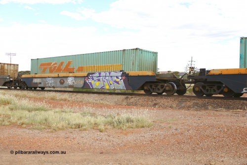 210407 9890
Parkeston, 2MP5 intermodal train, RRZY 7049 platform 1 of 5-pack well waggon set. Originally was an RQZY type, a five unit bar coupled well container waggon built as one of a batch of thirty two by Goninan NSW for National Rail in 1995/96. Recoded to RRZY when repaired. Loaded with a Toll 48' MEG1 type container TCML 48459. National Rail logo still visible.
Keywords: RRZY-type;RRZY7049;Goninan-NSW;RQZY-type;
