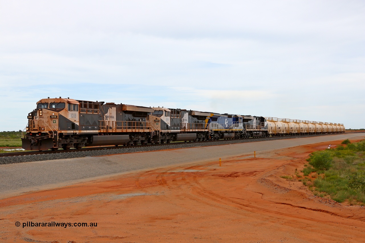 180117 1146
Great Northern Highway, 18 km grade crossing sees Roy Hill loaded fuel train with General Electric built ES44ACi units RHA 1018 serial 63829 leading RHA 1019, CFCLA lease unit Goninan ALCo to GE rebuild CM40-8M unit CD 4302 and RHA 1013 with eleven loaded fuel tank waggons. CD 4302 is the only unit powering as it was being tested. 17th January 2018.
Keywords: RHA-class;RHA1018;GE;ES44ACi;63829;