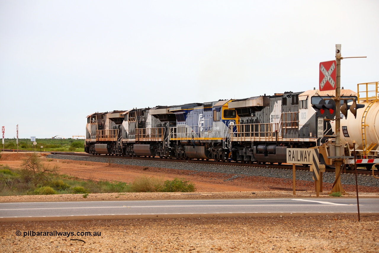 180117 1151
Great Northern Highway, between the 18 and 18.2 km grade crossings sees Roy Hill loaded fuel train with General Electric built ES44ACi units RHA 1018 serial 63829 leading RHA 1019, CFCLA lease unit Goninan ALCo to GE rebuild CM40-8M unit CD 4302 and RHA 1013 with eleven loaded fuel tank waggons. CD 4302 is the only unit powering as it was being tested prior to mainline service. 17th January 2018.
Keywords: CD-class;CD4302;CFCLA;Goninan;GE;CM40-8M;8297-2/93-137;rebuild;Comeng-NSW;ALCo;M636;9421;C6103-1;