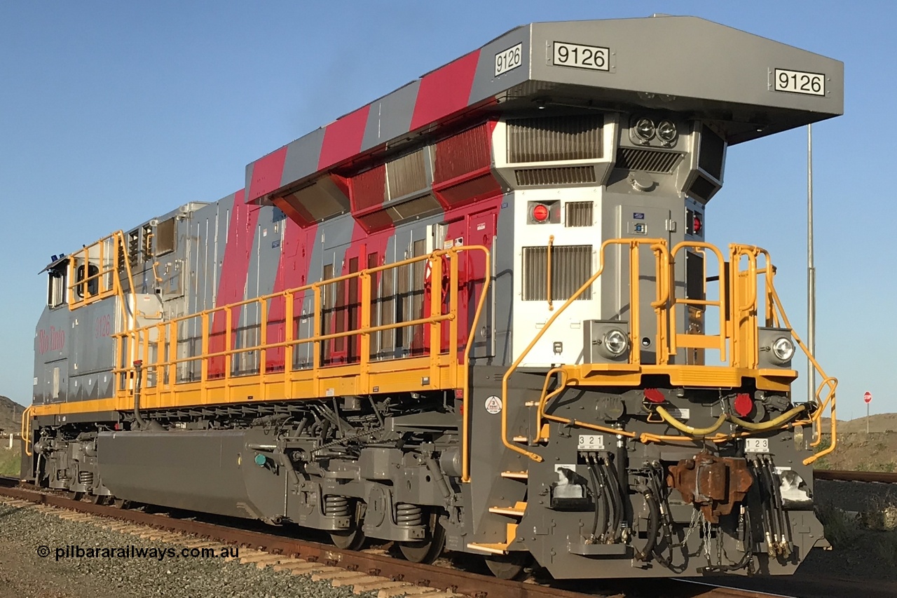 180208 4372
Cape Lambert Yard. Rear view of brand new GE built ES44ACi unit 9126 serial 64632 built date of October 2017 in owner's Rio Tinto stripe livery. 8th February 2018.
Roland Depth image.
Keywords: ES44ACi;GE;9126;64632;