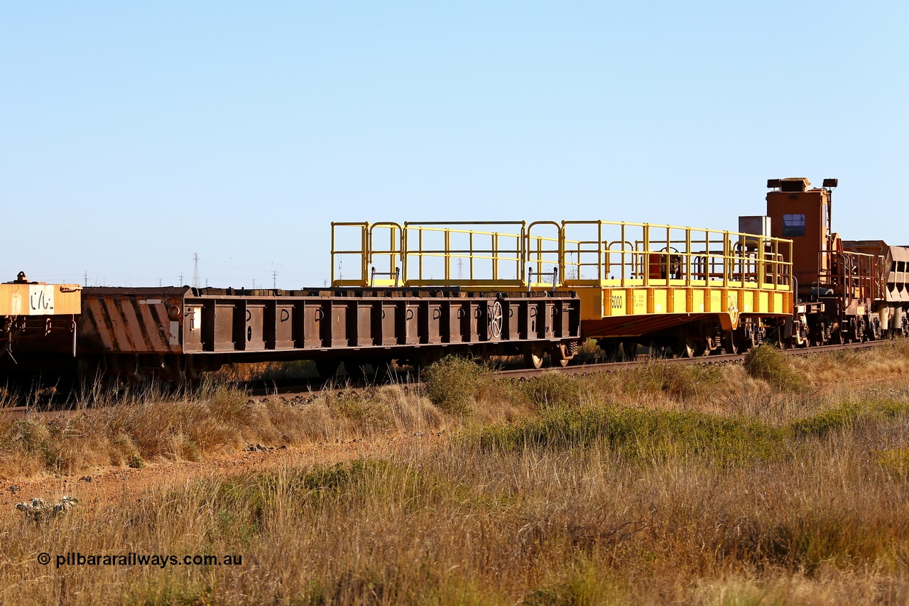 180527 1208
Pippingarra, near the 17 km on the former Goldsworthy line, BHP stored redundant service waggons, the two heavy weight waggons, the original Vickers Hoskins built 6004 137.1 tonne capacity Ortner Freight Car Company design, and the much newer Gemco WA built 100 tonnes capacity waggon. 27th May 2018. [url=https://goo.gl/maps/duWQ1f8kqf92]GeoData[/url].
